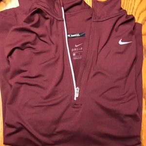 Woman’s Nike DRI-FIT quarter-zip jacket